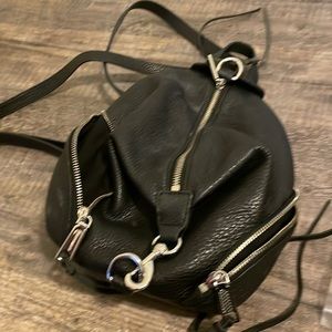Rebecca Minkoff medium Julian backpack in black pebbled leather.